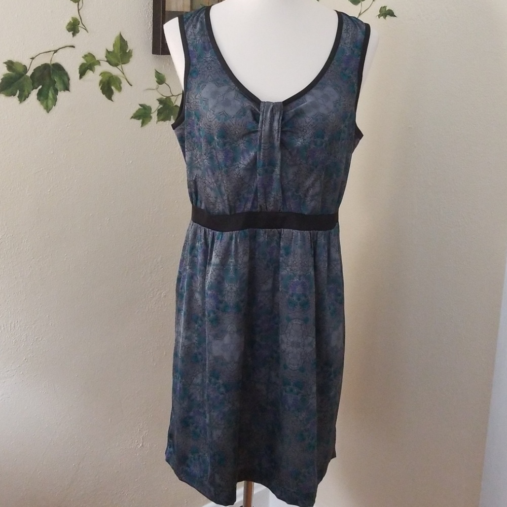 Gunmetal grey, teal and black sleeveless dress.